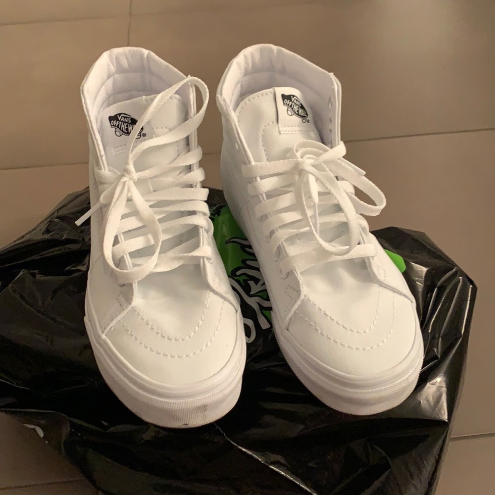 White hightop Vans